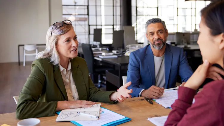 Businesswoman and businessman during a business meeting